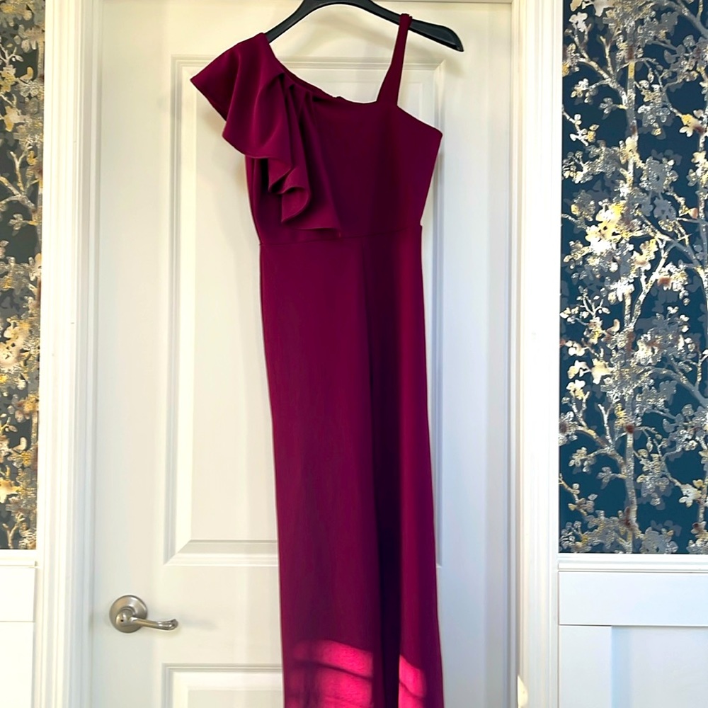 Cranberry romper size 12, ready for the run use once for a photo shoot